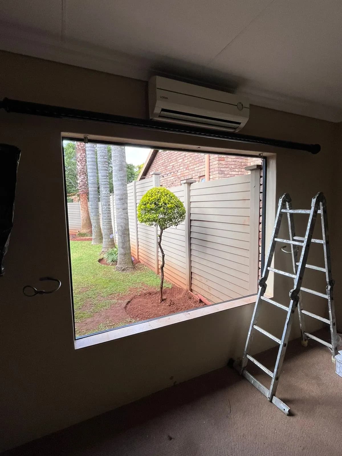 During: bedroom window opening after the old frame was removed